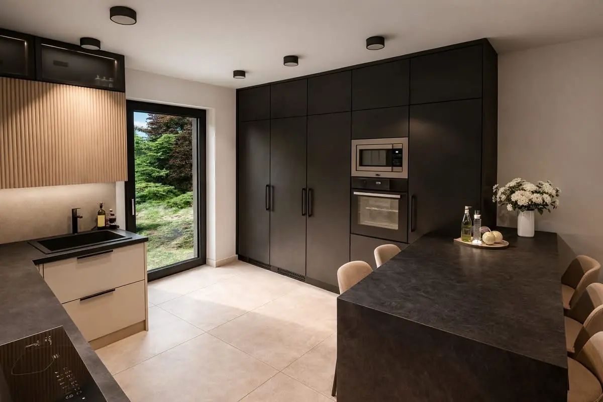 Modern black and oak kitchen with peninsula