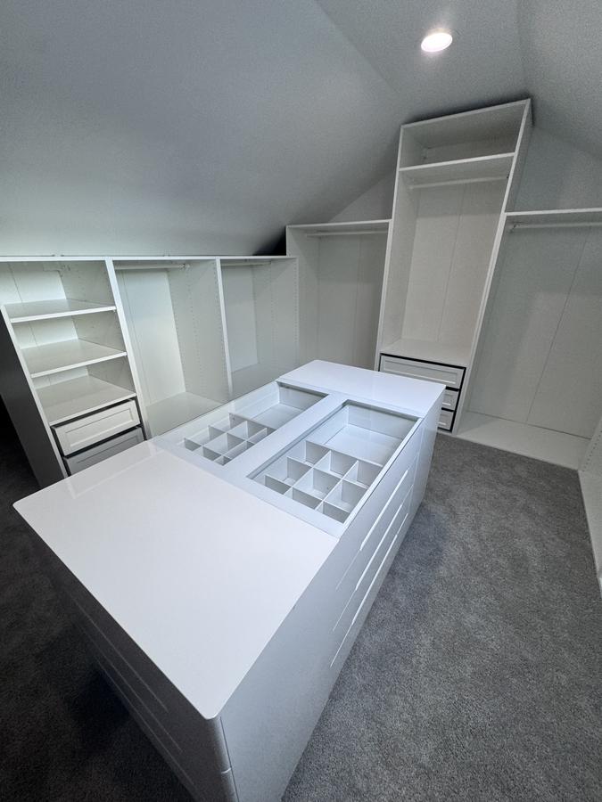 Walk-in closet island with drawers